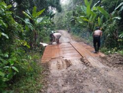 Satgas TMMD Ke-124 Kebut Pemasangan Papan Jembatan di Desa Talio