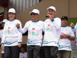 Kasatpol PP Damkar Murung Raya Turut Sukseskan Jalan Sehat HKN ke-61